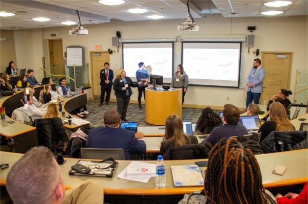 Students deliver their final presentation during the 2020 NASPAA Simulation Competition at the University of Albany.